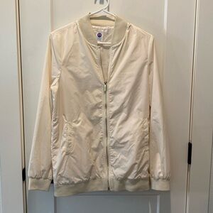 Ladies Joy Clean Boss Full Zip Jacket with Gold Color Zipper.  Cream Color.‎
